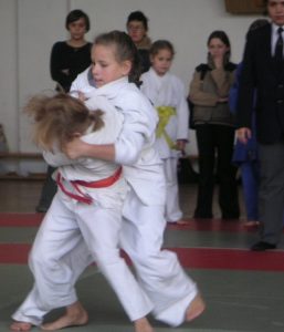 A picture of two girls showing why Judo is for kids